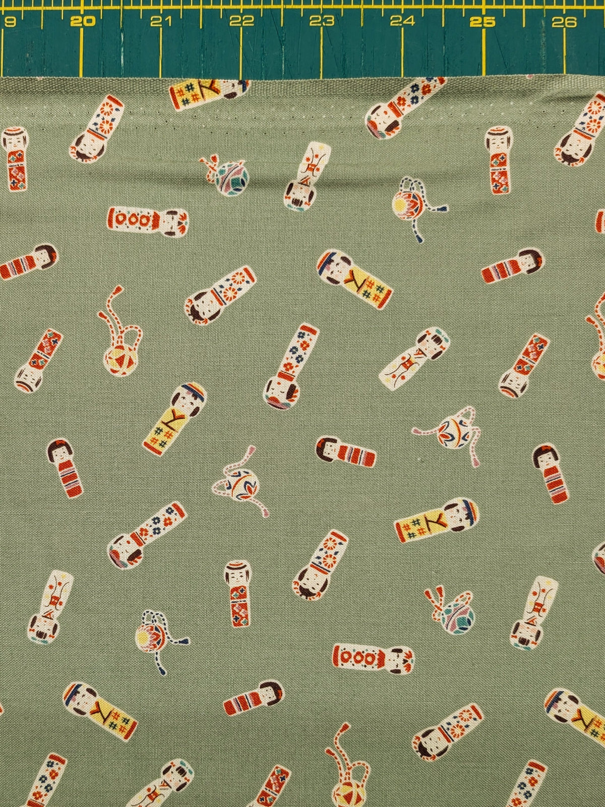 Cosmo - Kokeshi Doll Cotton Sheeting Fabric - Green