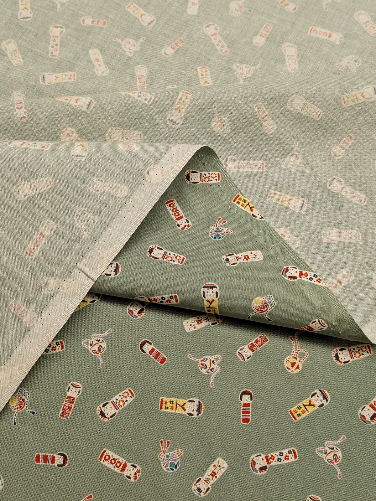 Cosmo - Kokeshi Doll Cotton Sheeting Fabric - Green