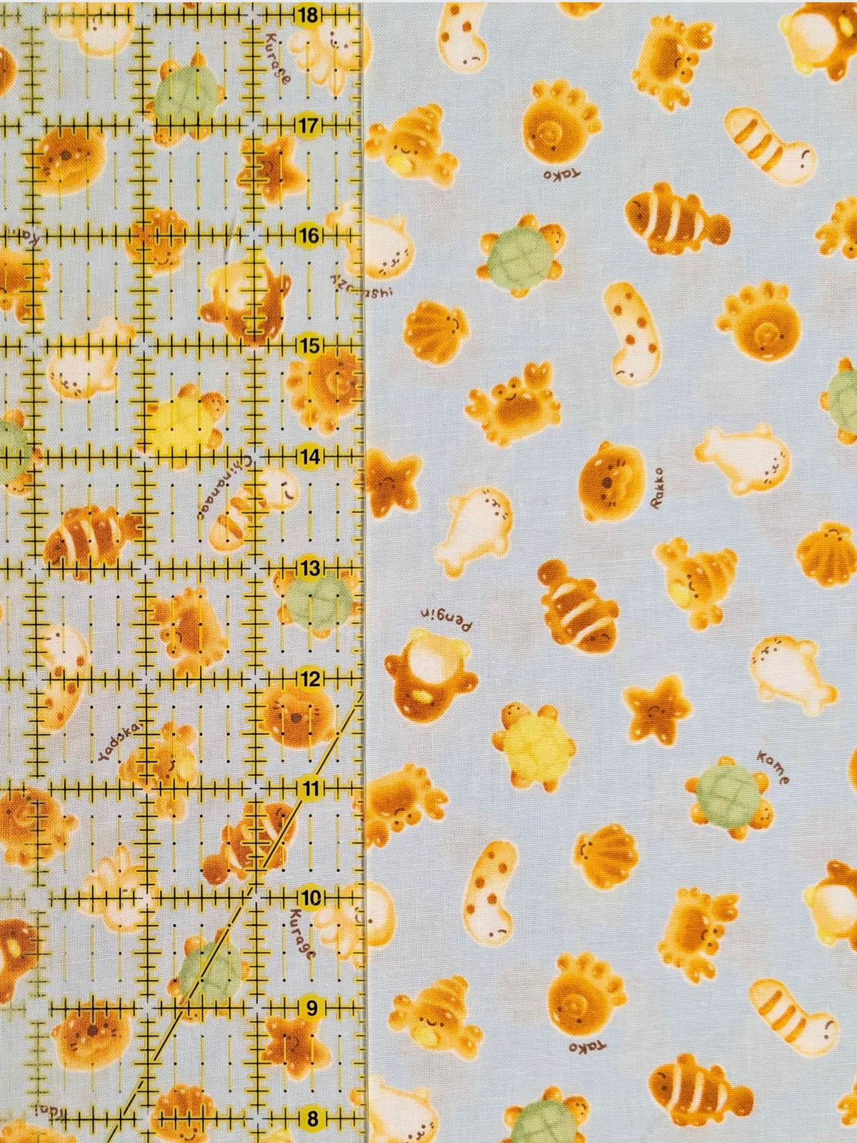 Cosmo - Cutesie Ocean Breads Cotton Sheeting Fabric - Blue