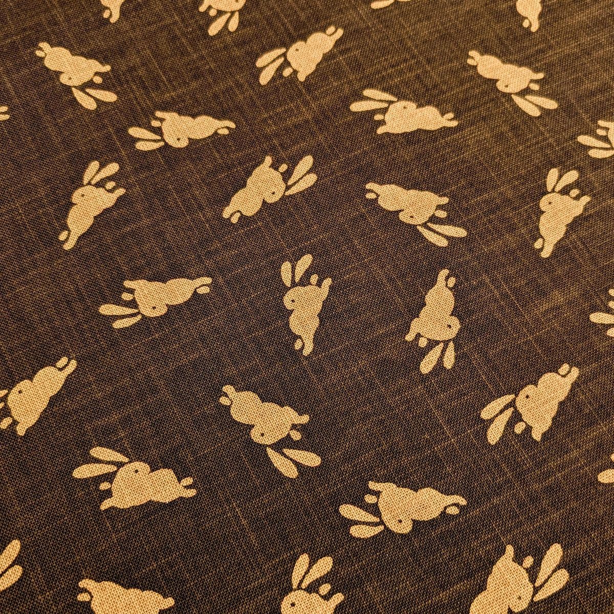 Bouncing Bunnies hand stenciled Japanese cotton fabric KP7090-95 C brown- half yard