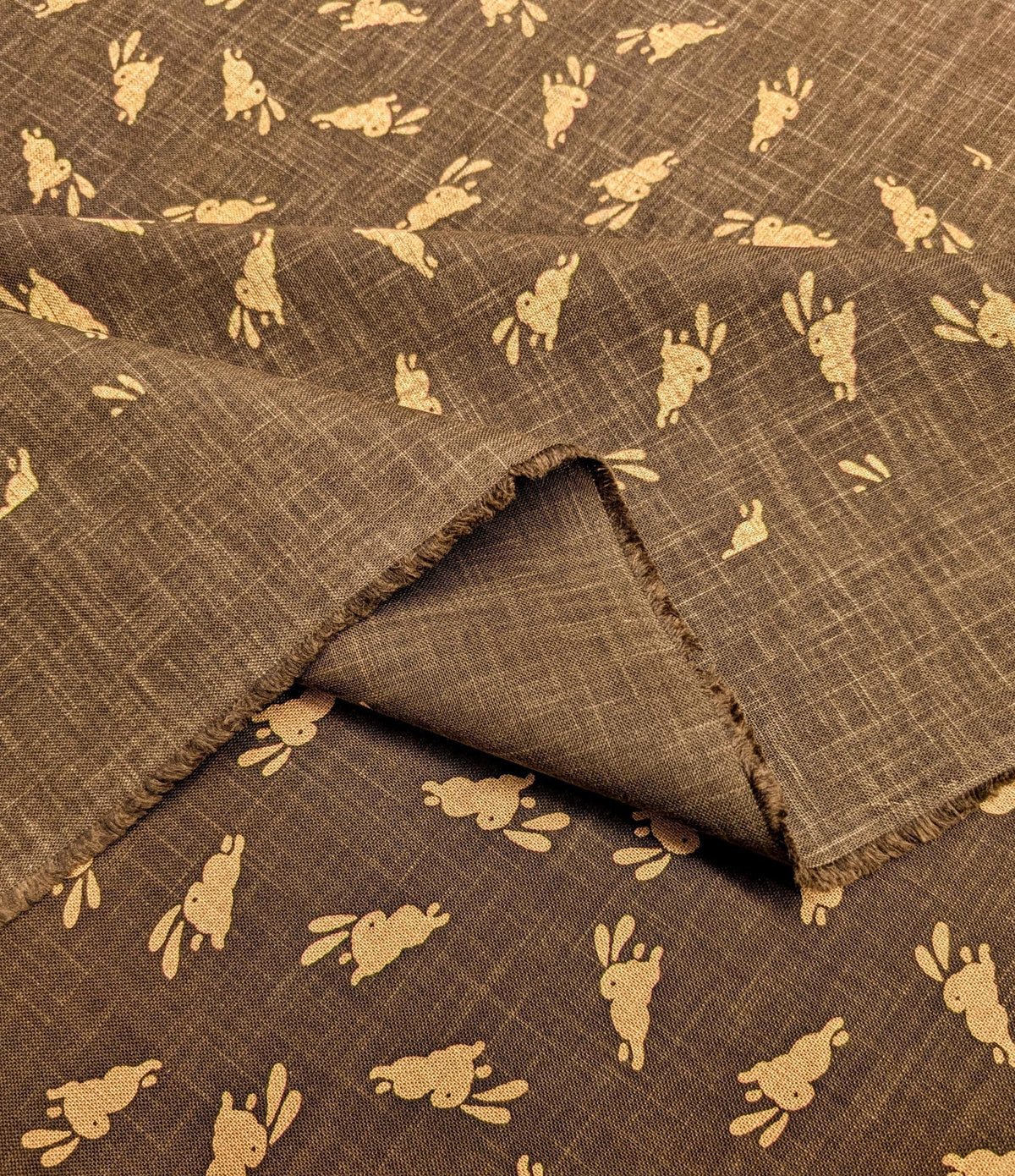 Bouncing Bunnies hand stenciled Japanese cotton fabric KP7090-95 C brown- half yard