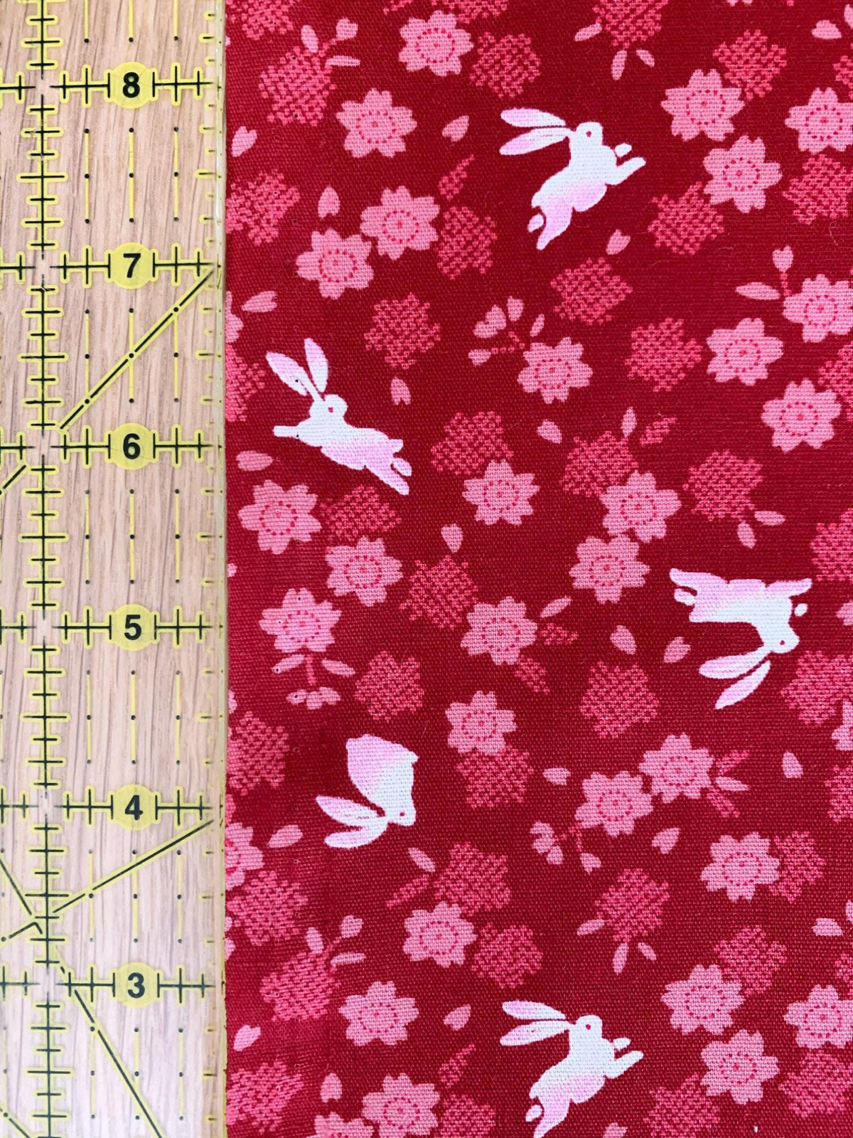 Rabbits and Cherry Blossoms Japanese cotton fabric 3060-27E red