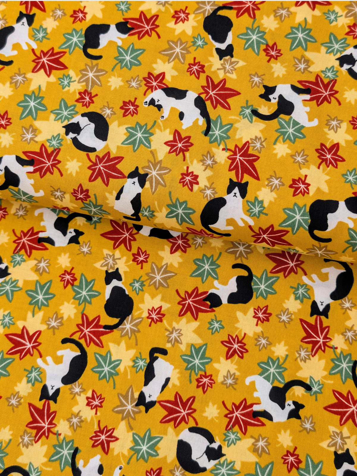 Cosmo - Maple Leaves & Cats Cotton Sheeting Fabric - Mustard Yellow