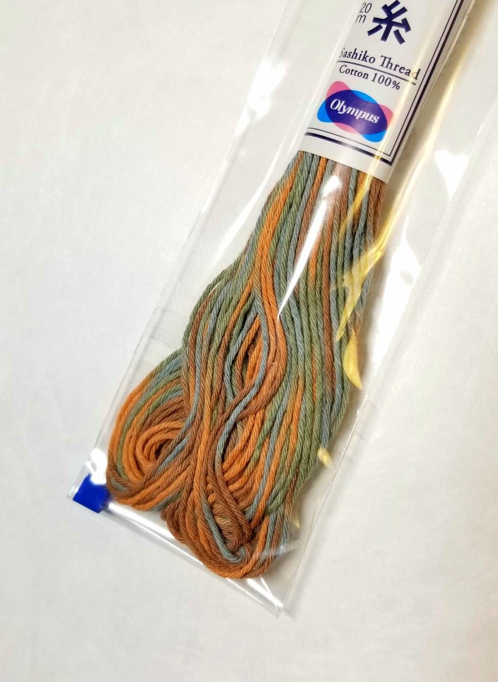 Olympus - Cotton Sashiko Thread 20m Skein - Color #91 Variegated Grunge Pastel