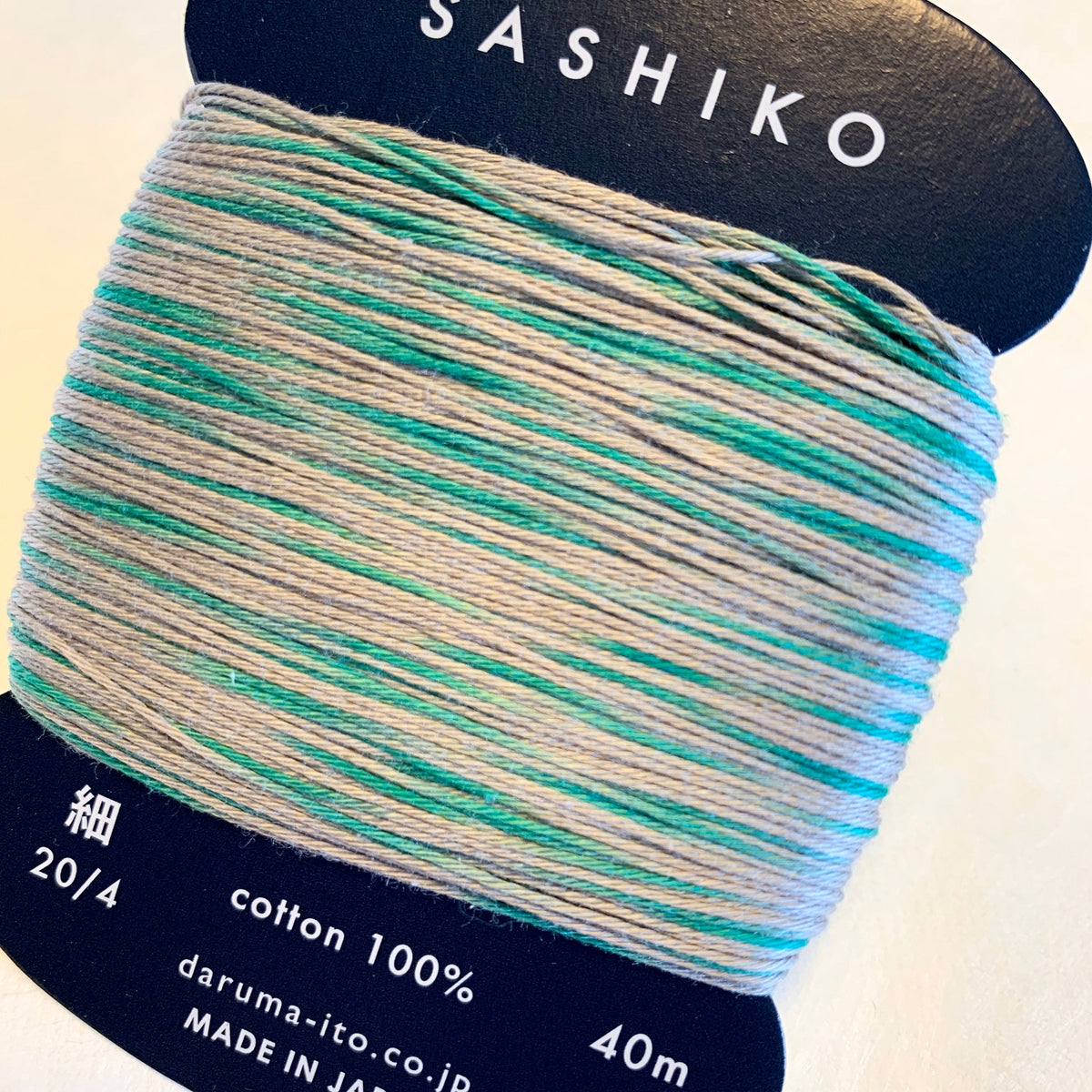 Daruma - Cotton Sashiko Thread 40m Card 20/4 - #301 Variegated Silver Gray and Spring Green